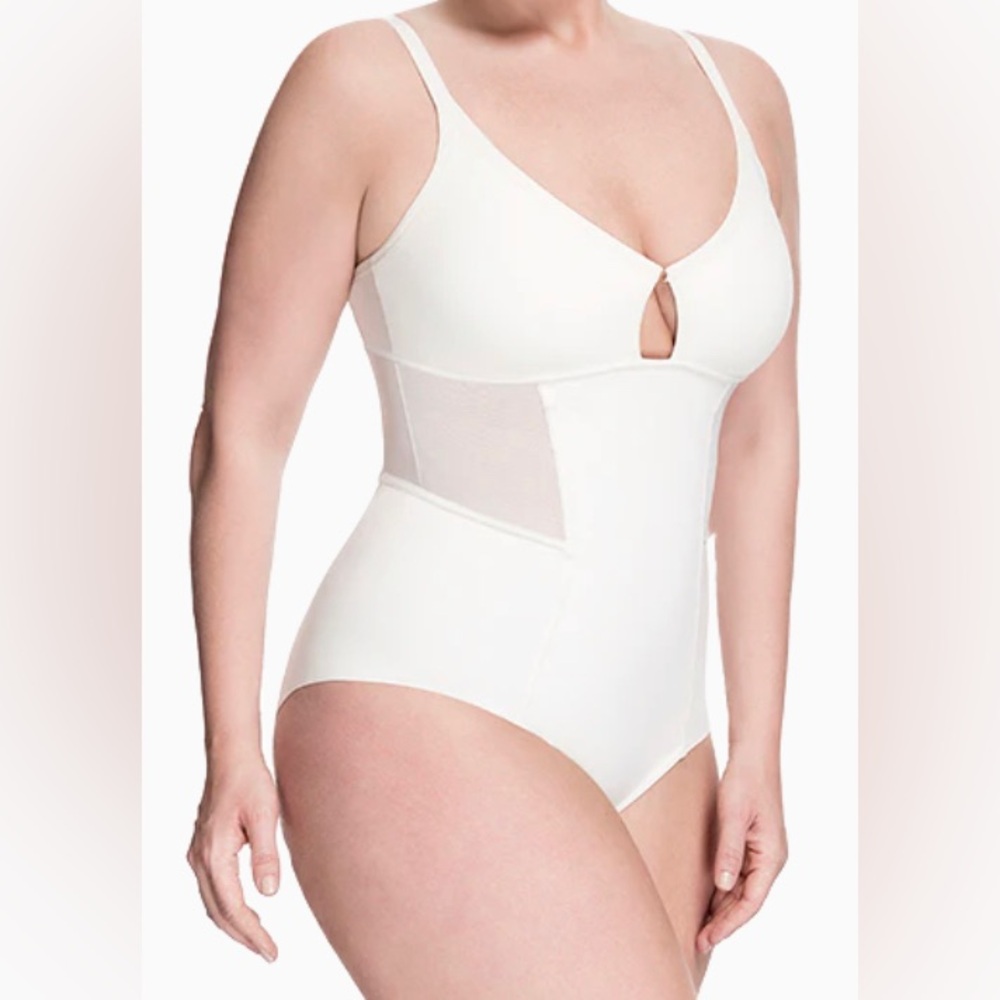 New w/out tag. SQUEEM. Sheer allure bodysuit. XS & S